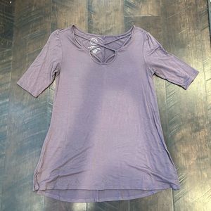 Purple blouse with criss-crossed details